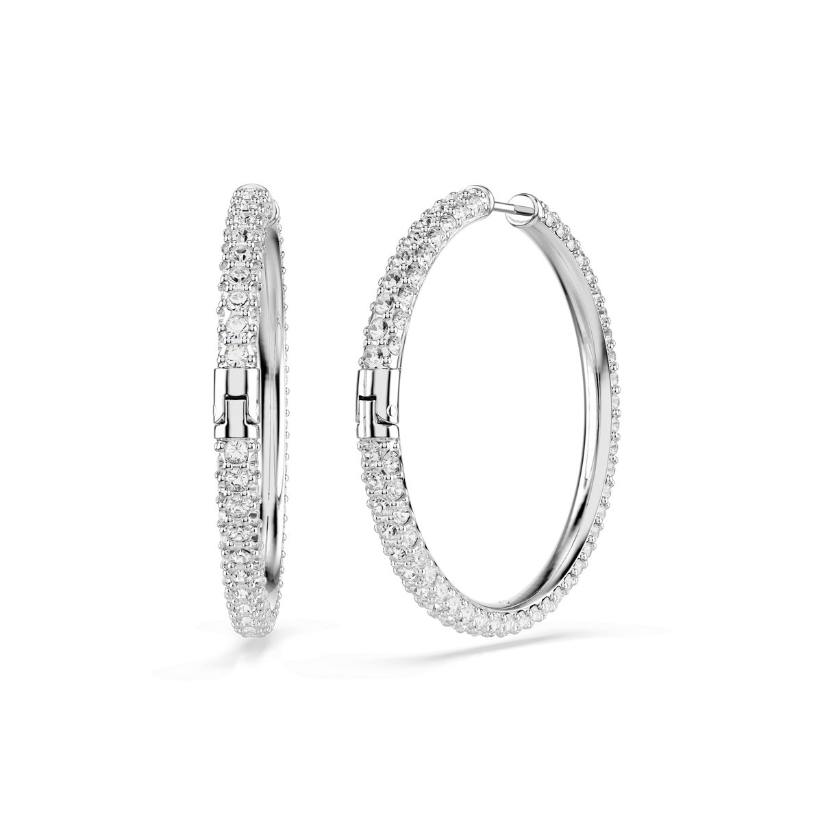 Two Swarovski Dextera hoop earrings, featuring round-cut white crystals and a rhodium-plated finish, are displayed against a plain white background. One earring is shown from the side while the other is presented from the front.