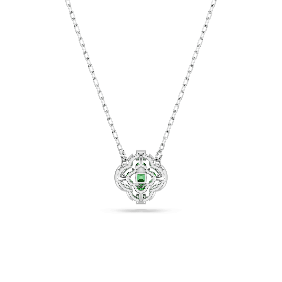 A Swarovski Una Angelic pendant, featuring mixed cuts and a small green Swarovski Zirconia set at the center of its geometric rhodium-plated design, is displayed on a plain white background.