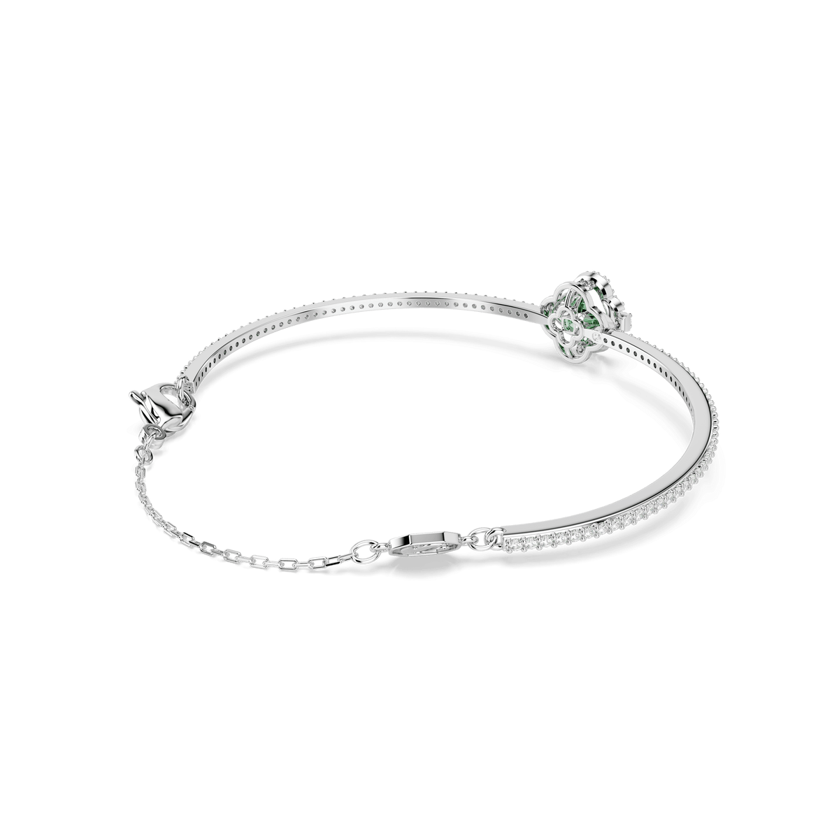 Experience the elegance of the Swarovski Una Angelic bangle, beautifully rhodium plated and adorned with mixed-cut stones. This refined piece features a striking central green Swarovski Zirconia surrounded by pavé-set clear stones along its slender band, presented against a white background.