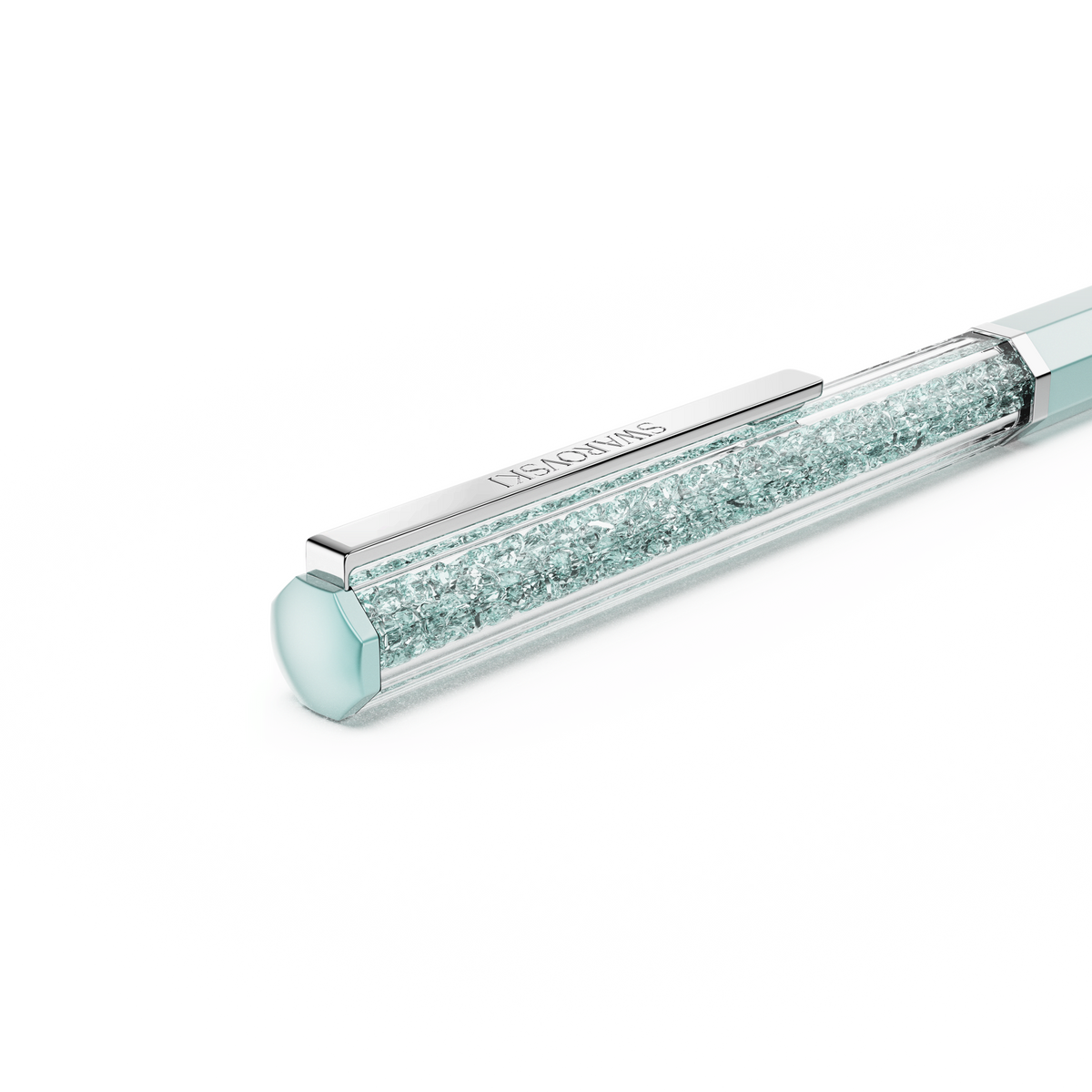 A close-up of the Swarovski Crystalline ballpoint pen, featuring a blue lacquered barrel filled with sparkling blue crystals and accented with chrome-plated and light blue details, set against a plain white background.