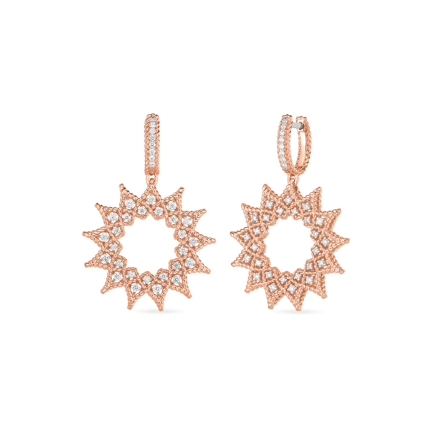 Introducing the Roberto Coin18K Rose Gold Roman Barocco Diamond Accent Medium Sunburst Drop Earrings. This exquisite creation by Roberto Coin showcases an elegant sunburst design, embellished with small, round diamonds. A circular hoop at the top seamlessly complements the intricate geometric patterns radiating outward, resulting in a stunning and sparkling appearance.