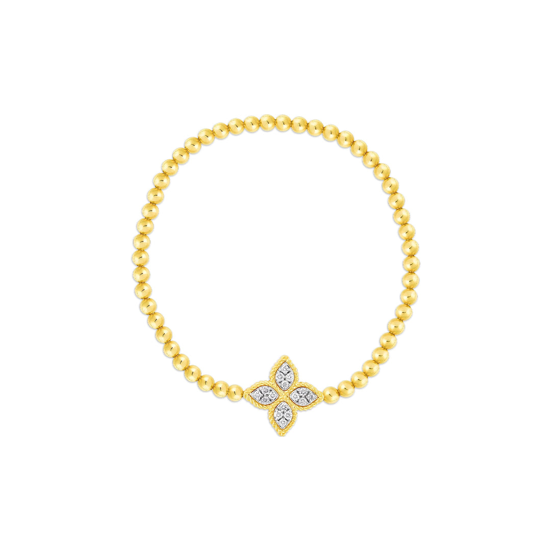 The Roberto Coin Princess Flower 18K Yellow Gold Diamond Stretch Bracelet features a central Princess Flower motif with sparkling diamonds, displayed against a white background.