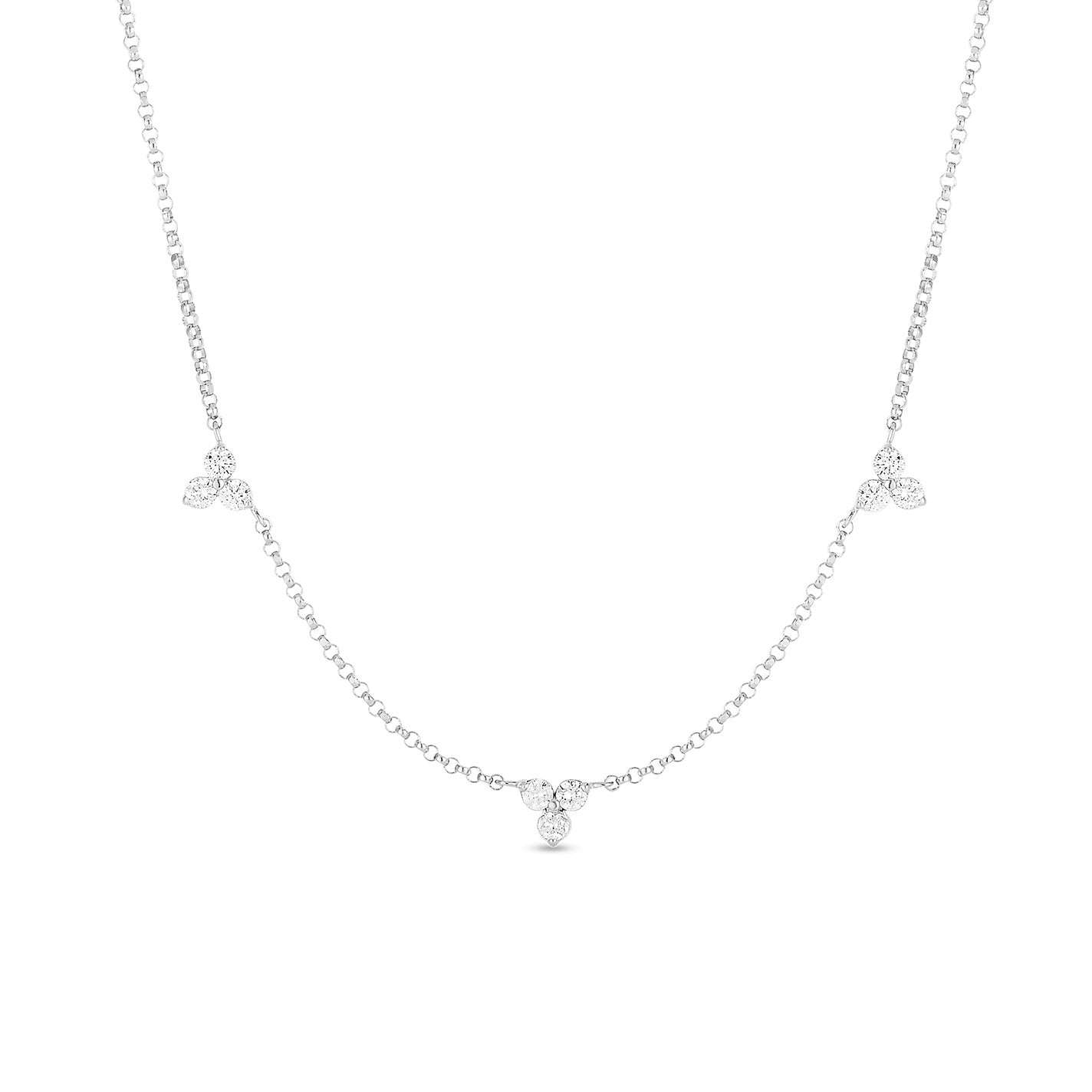 The Roberto Coin Diamonds by the Inch 18K White Gold Three Stations Necklace showcases a minimalist design with three small clusters of sparkling gemstones elegantly spaced along the chain, similar to Roberto Coin's signature style, for a refined and sophisticated appearance.