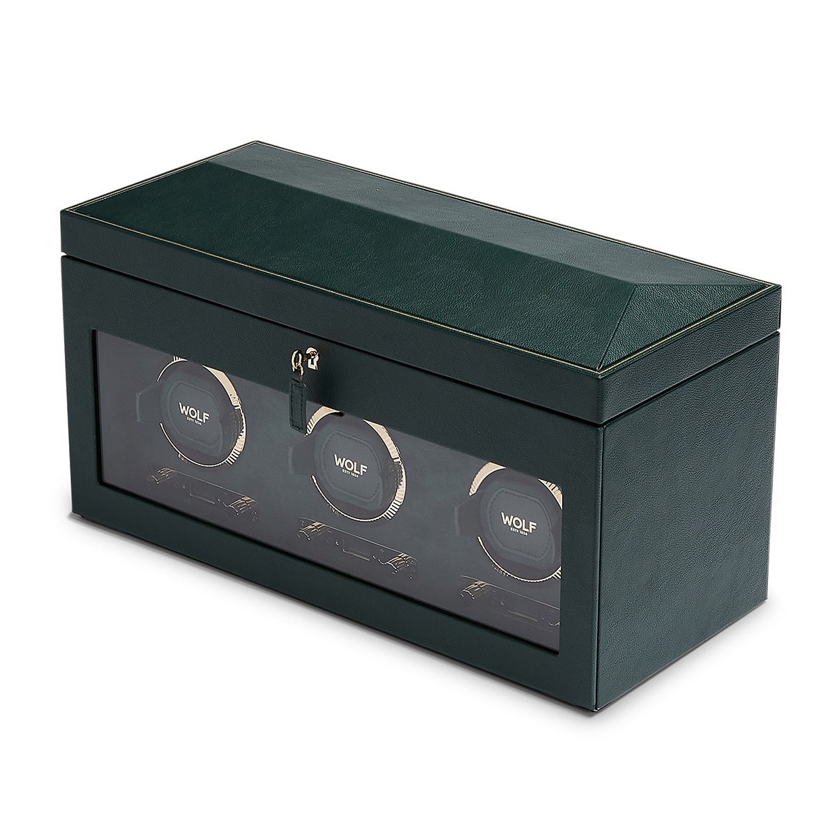 Introducing the WOLF 1834 British Racing Green Triple Winder: a sophisticated dark green watch winder box with a transparent front showcasing three circular watch holders. Crafted from vegan leather, this elegant box features a textured surface and hinged lid, accented with a delicate gold line for a touch of classic British Racing style.