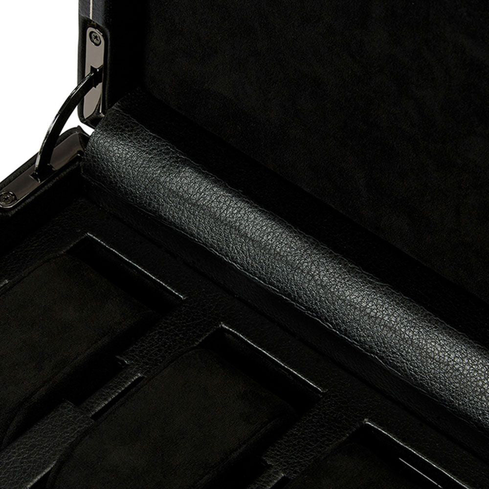 Close-up of an open WOLF 1834 British Racing 10 Piece Watch Box, highlighting the interior compartments and textured surface. The box is lined with a soft material and features multiple slots for organizing items, including a convenient watch USB port.