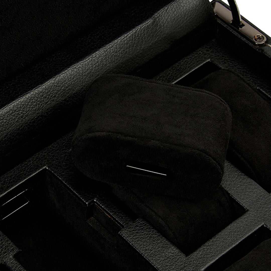 Detailed view of the WOLF 1834 British Racing 15 Piece Watch Box, displaying its interior designed with compartments for watch storage. Each section is lined with soft black vegan leather by the brand WOLF, highlighted by a sleek and organized design.