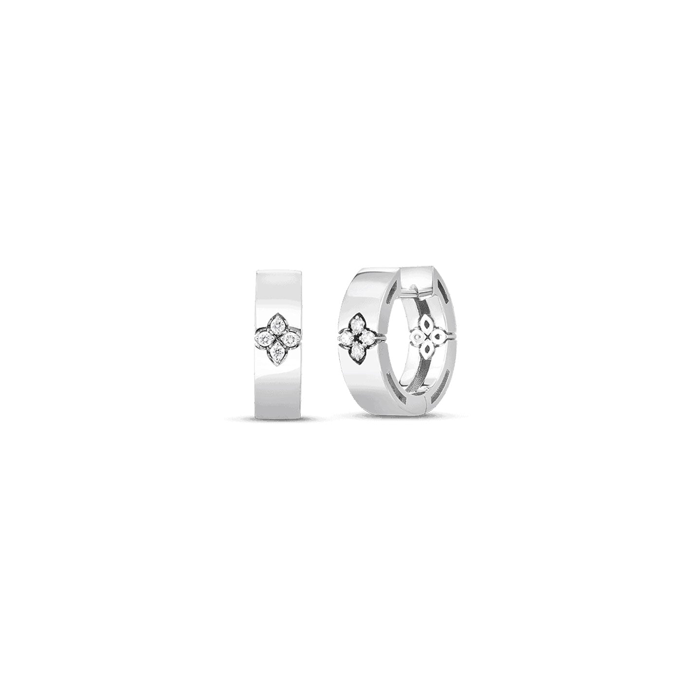 A pair of Roberto Coin Love In Verona small hoop earrings crafted from 18k white gold, each featuring a star-shaped embellishment with a dazzling diamond at the center, elegantly displayed on a plain white background. These graceful earrings from Roberto Coin epitomize timeless beauty and sophistication.