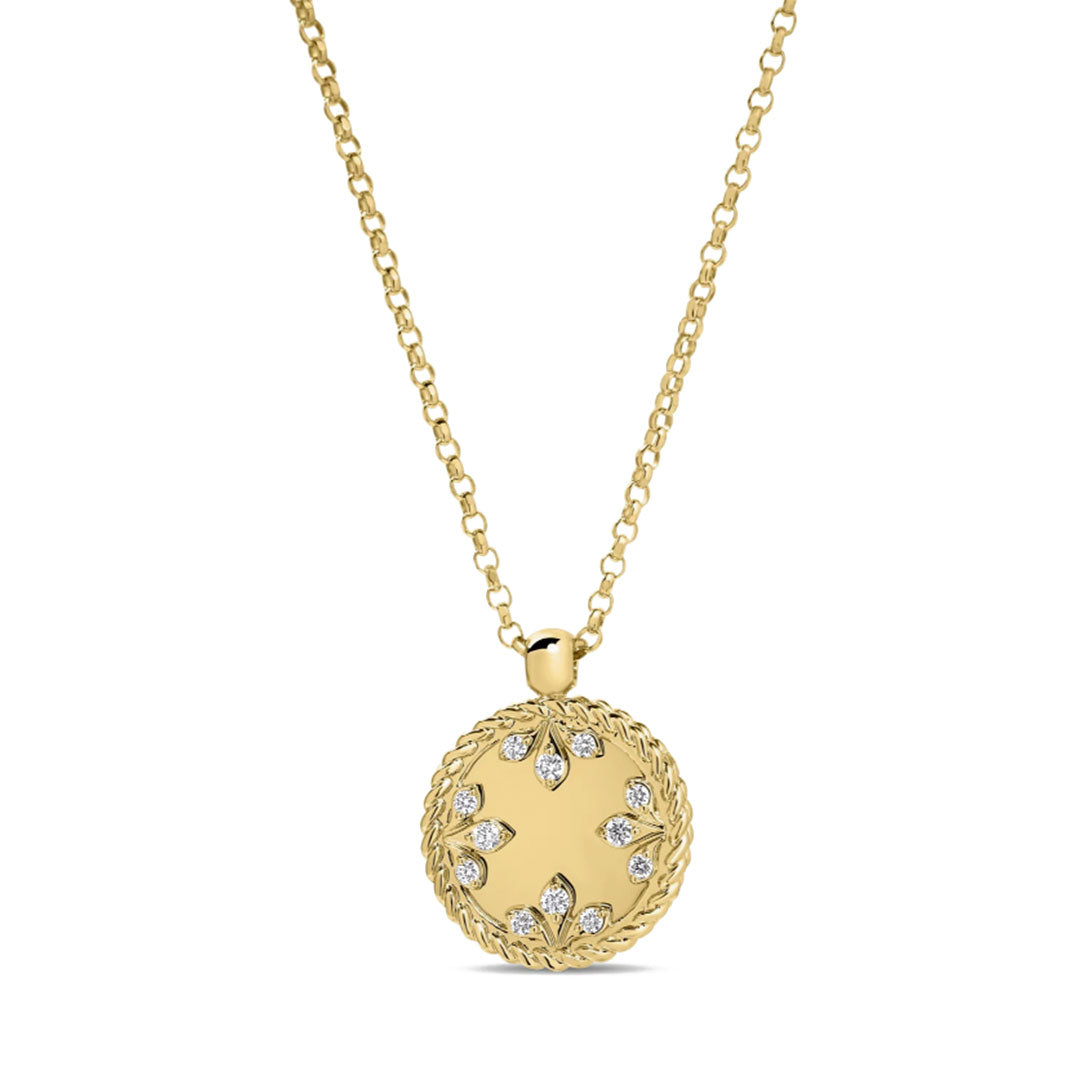 The Roberto Coin Venetian Medallions 18K Yellow Gold Diamond Small Necklace Pendant features a round, floral diamond-accented medallion with a twisted rope border on a delicate gold chain.