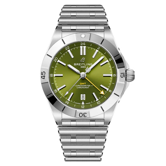 The limited edition BREITLING Chronomat Automatic GMT 40 Giannis Antetokounmpo features a green dial with the Breitling logo, silver hour markers, a date window at 6 o'clock, and a metal link band. Its bezel has numerals and offers GMT functionality, celebrating Giannis Antetokounmpo's excellence.