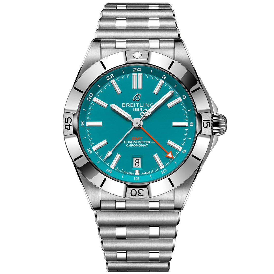 The Breitling Chronomat Automatic GMT 40 features a stainless steel case, turquoise dial, silver indices and hands, date at 6 o’clock, silver bracelet, minute-marked bezel, and an orange-tipped second hand inspired by the Miami Dolphins.