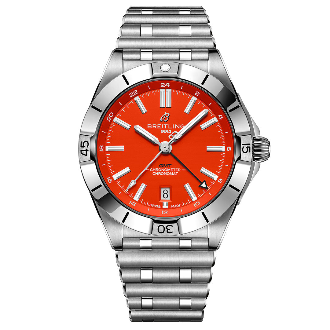 The BREITLING Chronomat Automatic GMT 40 features a stainless steel case, vivid orange dial, silver markers, and date at 6 o’clock—ideal for Cincinnati Bengals fans—shown on a metal link bracelet against a white background.
