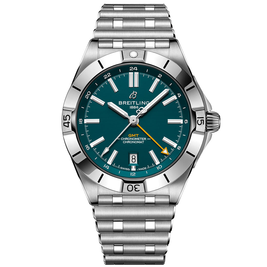 The BREITLING Chronomat Automatic GMT 40 by Breitling features a stainless steel case, teal dial, silver hour markers, date window at 6 o’clock, metal link band, and a rotating bezel.