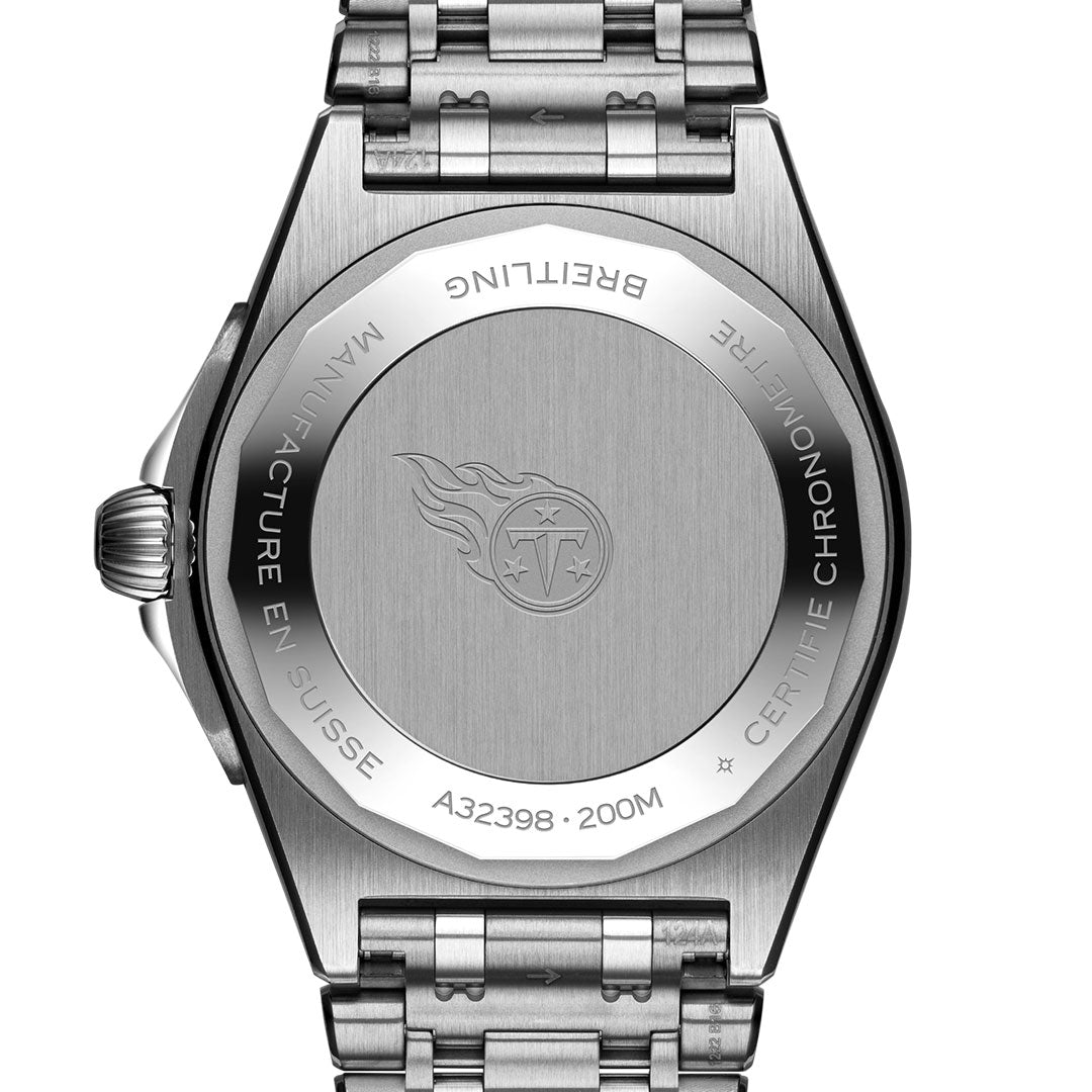 Back of the BREITLING Chronomat Automatic GMT 40 shows engraved "MANUFACTURE EN SUISSE," "CERTIFIE CHRONOMETRE," "A32398," "200M," a flame logo, and more on its stainless steel case back.