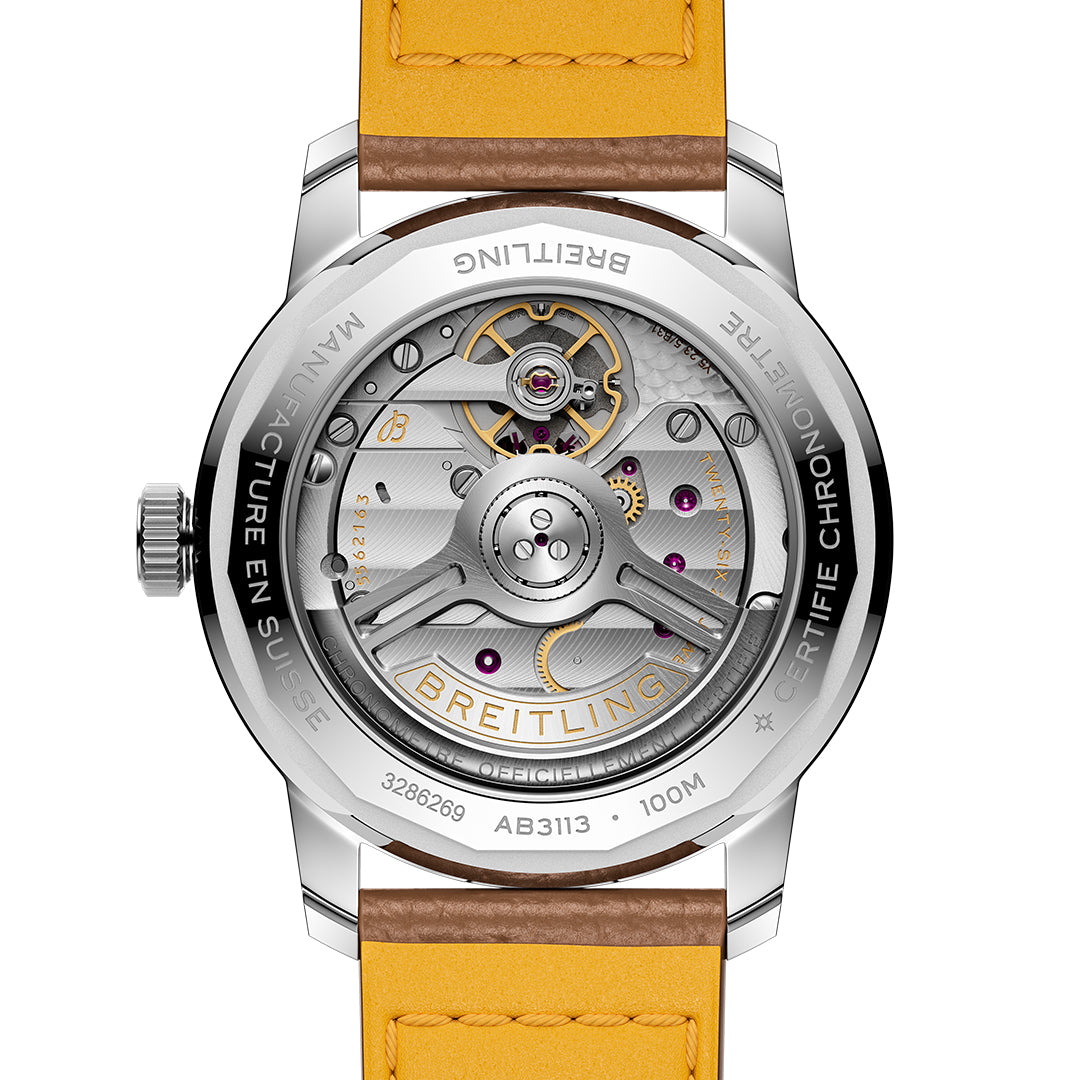 The back of the BREITLING Top Time B31 38 reveals the intricate Manufacture B31 movement through a transparent case, with "Breitling" and technical details etched on its stainless-steel edges. A vibrant yellow leather strap completes this sophisticated watch.