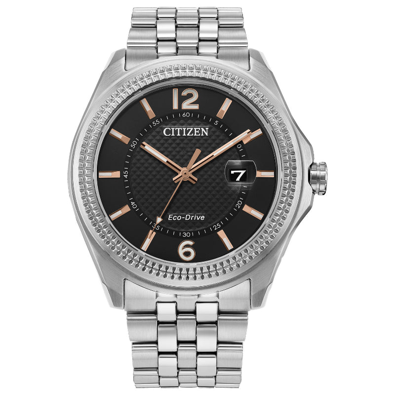 The CITIZEN Corso Eco-Drive 41mm Watch features a silver stainless-steel bracelet and case, complemented by a black dial. Gold-toned hour markers and hands enhance its elegance, along with a date window at the 3 o'clock position and a textured bezel.