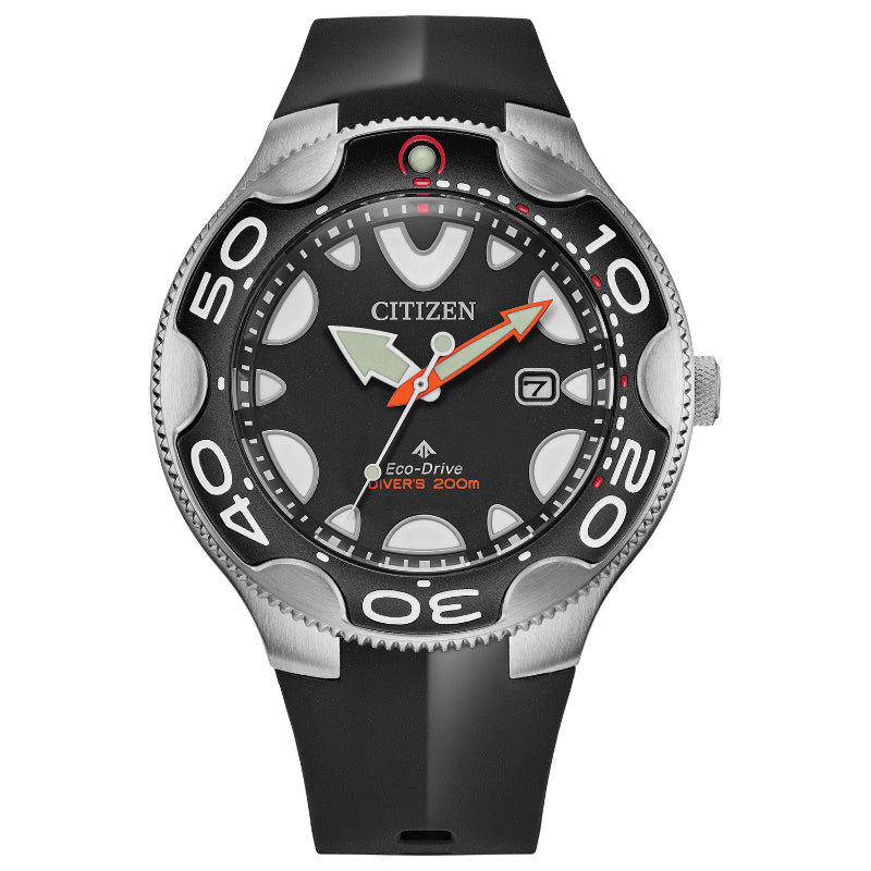 The CITIZEN Promaster Dive Eco-Drive 46mm Watch boasts a black and silver bezel, bold hour markers, luminescent hands, and a distinct orange arrow-shaped minute hand. The dial prominently displays "Eco-Drive" and "Diver's 200m," along with a date window on the right side.