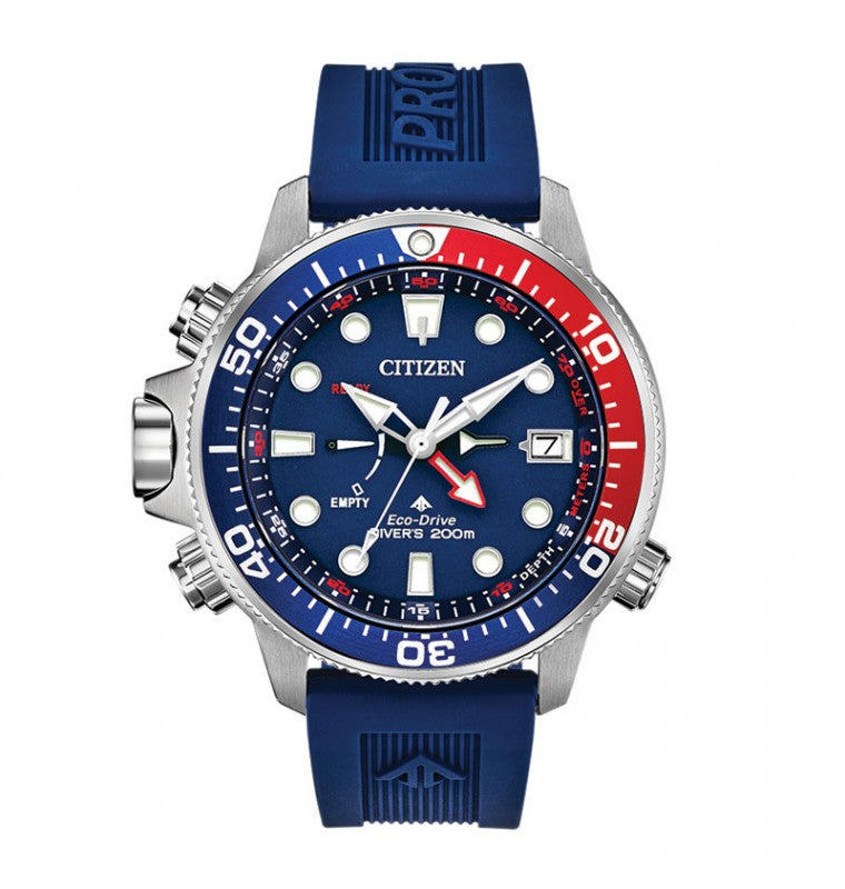 The CITIZEN Promaster Aqualand Eco-Drive 46mm Watch features Eco-Drive technology, along with a vibrant blue dial and an eye-catching red and blue bezel. It includes luminous markers, a date display, and a robust blue rubber strap, skillfully crafted to withstand water resistance up to 200 meters.