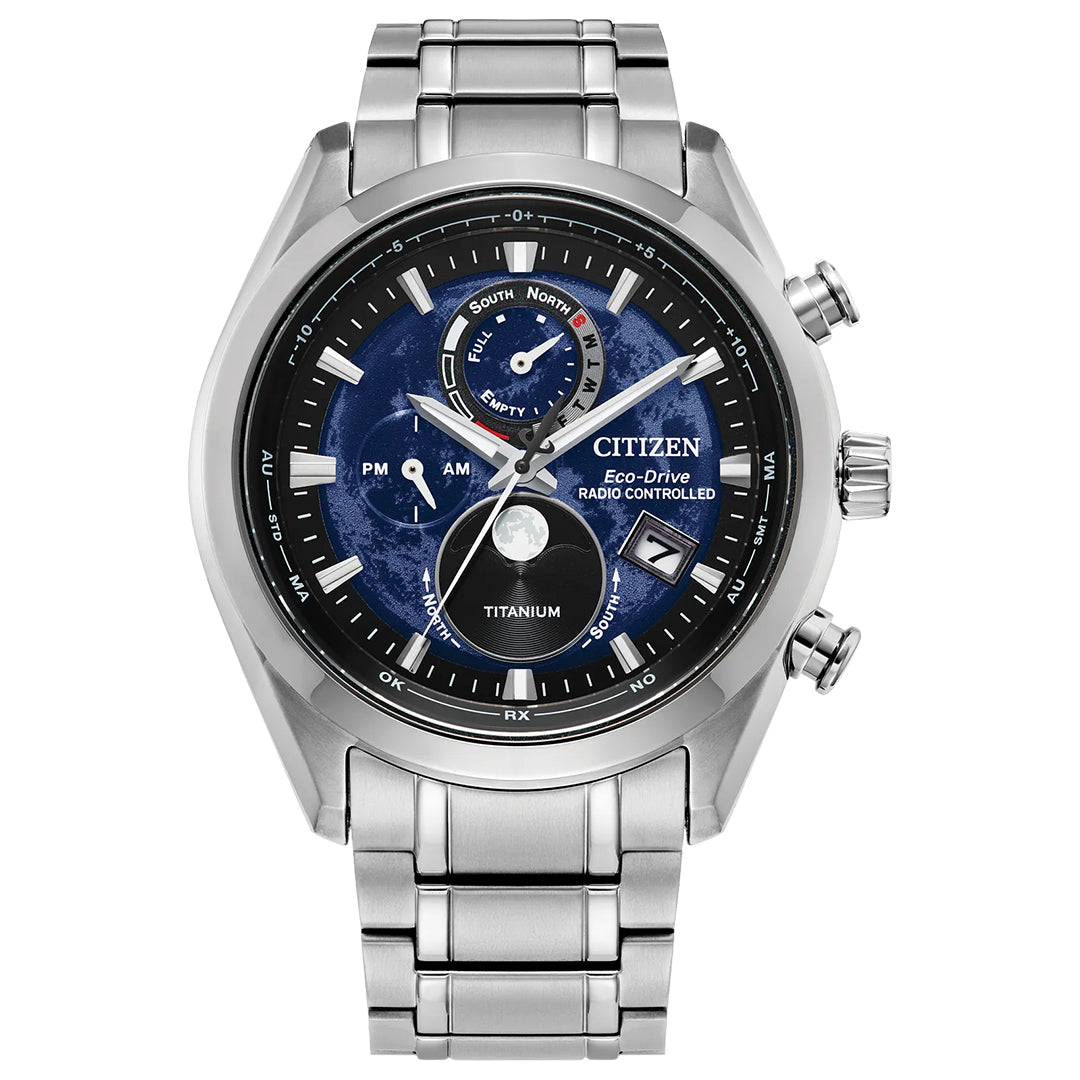 The CITIZEN Tsuki-yomi A-T is a 43mm Super Titanium Eco-Drive watch with atomic timekeeping, a blue-black dial with multiple subdials, silver hour markers, analog time and calendar display.