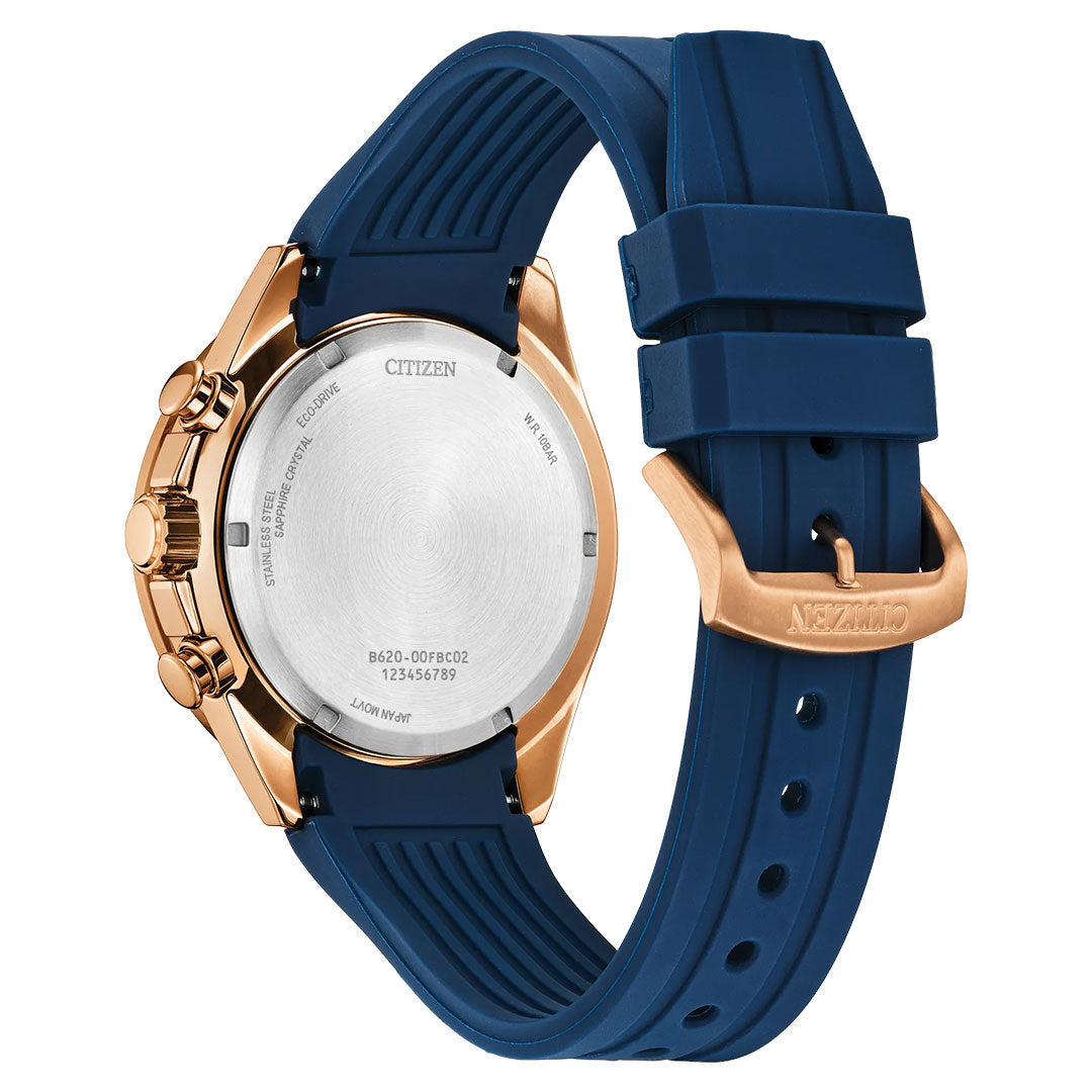 The CITIZEN Endeavor Chrono Eco-Drive 43mm Watch features a gold-tone case, blue silicone strap, silver case back with engraved markings, and a buckle clasp—a nautical chronograph by CITIZEN.
