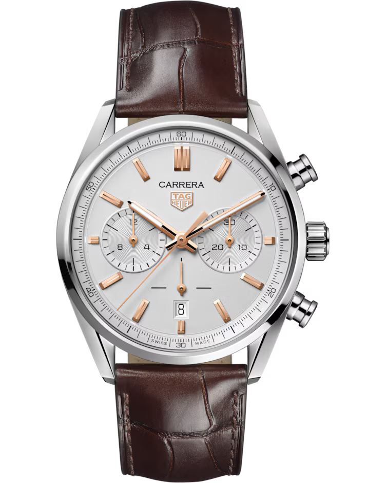 The TAG Heuer Carrera Chronograph Automatic 42mm Watch by TAG Heuer features a silver dial with rose gold markers, two subdials, a date window at 6 o’clock, and a brown leather strap.
