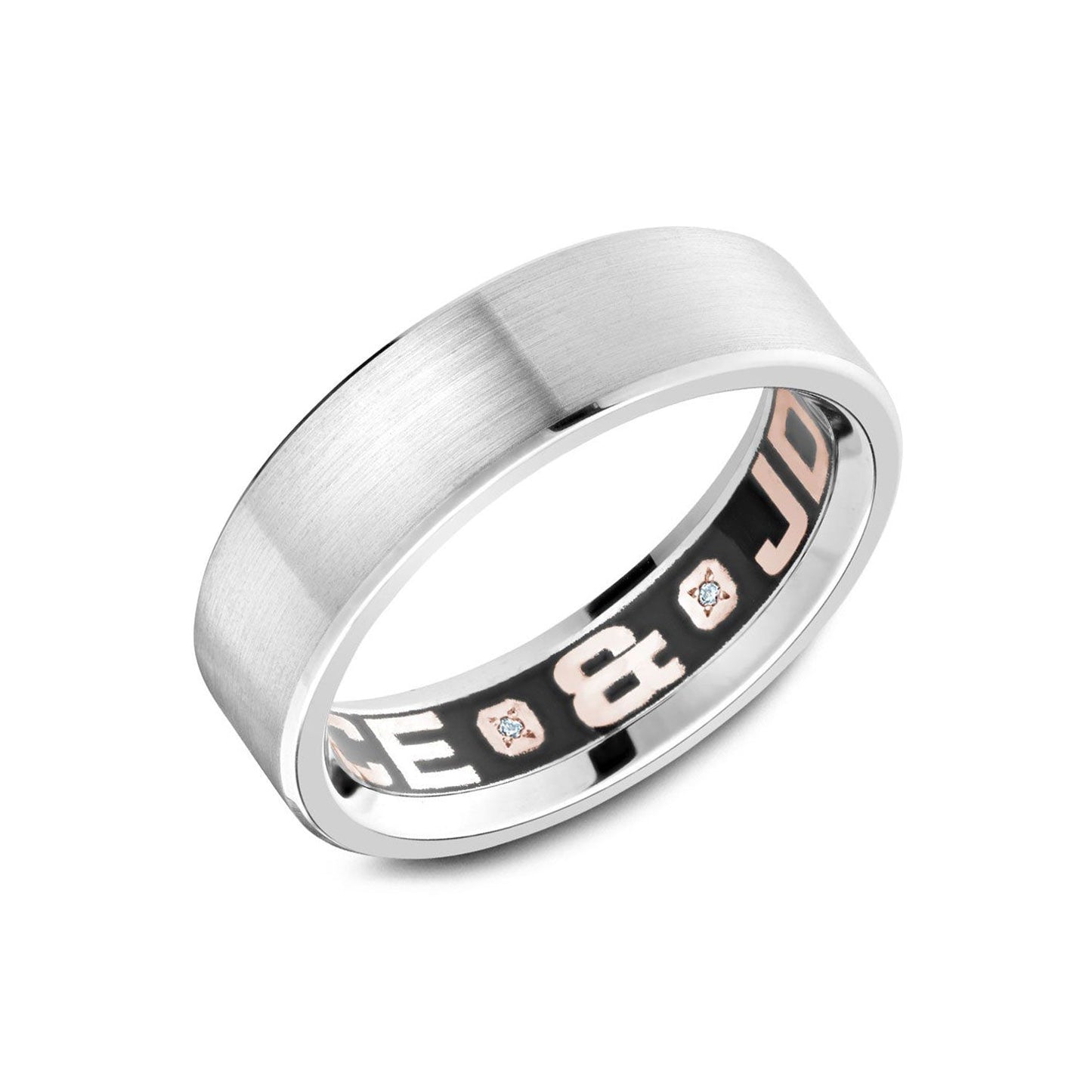 A sophisticated Crown Ring Carlex wedding band crafted in 18K white gold, featuring a sandpaper finish exterior and enhanced with a round brilliant diamond accent. The polished interior adds an elegant touch, making this piece an ideal choice for any occasion.