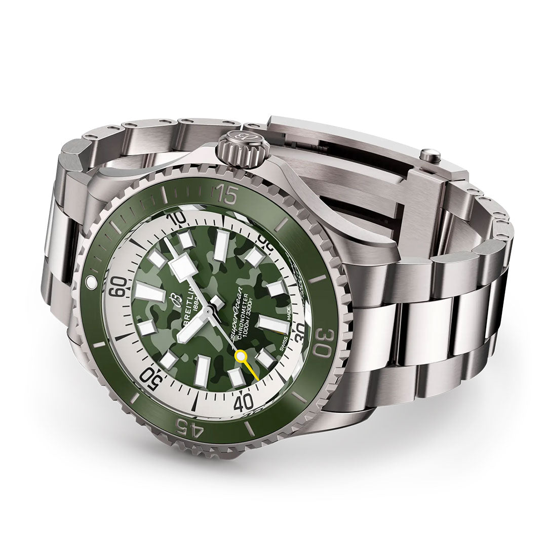 A BREITLING Superocean Automatic 46 Super Diver watch with a green and white camouflage dial, green bezel, and silver hour markers is shown angled on a white background.