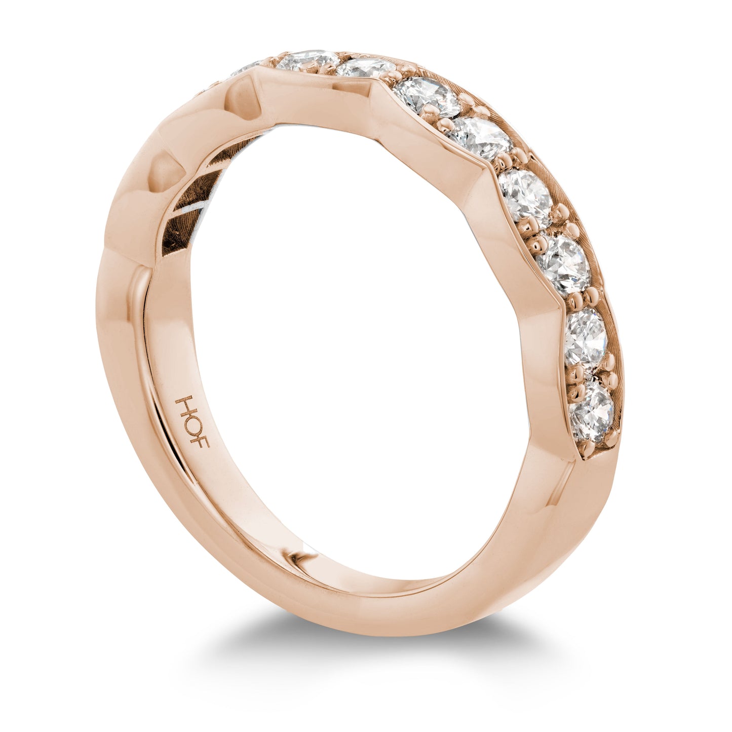 The Hearts On Fire Lorelei Floral 18K Rose Gold Round Brilliant Diamond Anniversary Ring showcases a distinctive faceted band design adorned with a row of brilliant round diamonds set on half the band. Stamped with "HOF" on the interior, this ring offers a modern and elegant charm, making it an ideal choice for any special occasion.