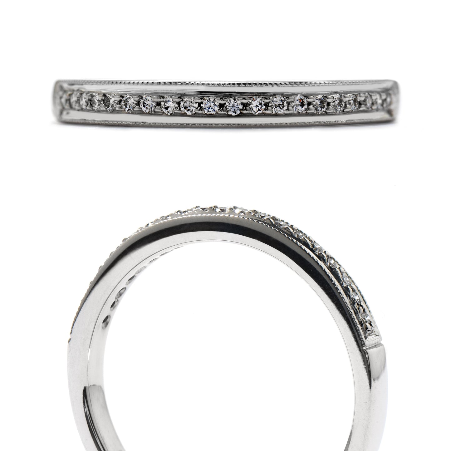 A close-up of the Hearts On Fire Platinum Round Brilliant Diamond Anniversary Ring displays a row of exquisite round diamonds set along the band. The top view showcases the intricate diamond arrangement, while the side profile accentuates the ring's sleek and polished surface, highlighting its renowned Hearts on Fire brilliance.
