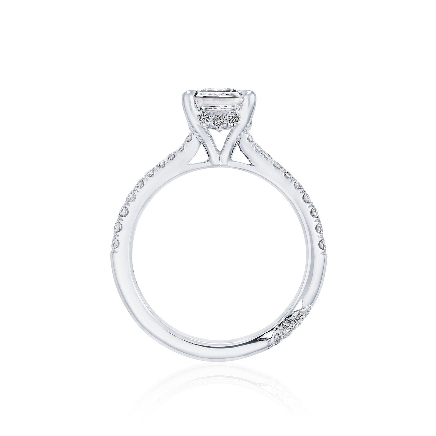 The Tacori Founder's Collection RoyalT Platinum Emerald Solitaire Semi Mount with Diamond Band Engagement Ring by Tacori showcases a sophisticated setting with a prominent emerald center stone, complemented by smaller diamonds along the band to enhance its intricate design.