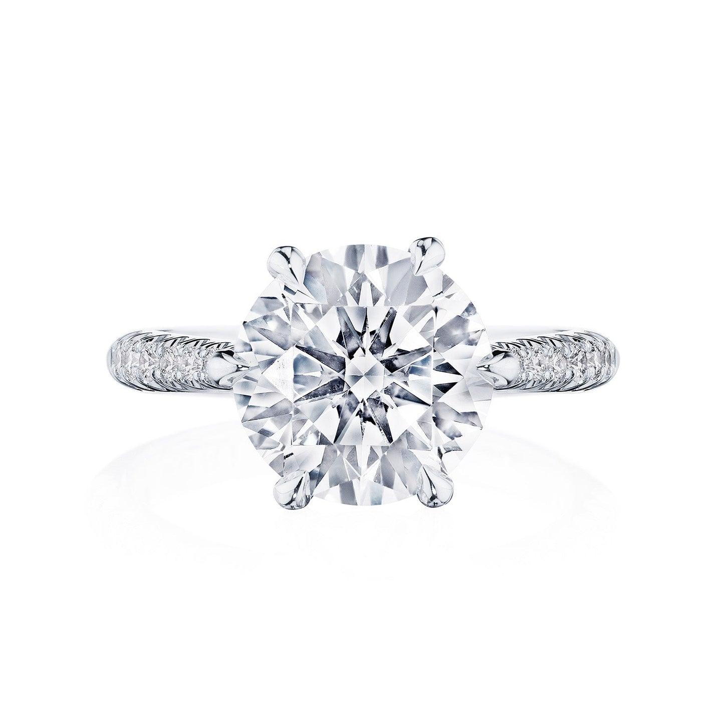 The Tacori Founder's Collection RoyalT Platinum Round Brilliant Solitaire Semi Mount with Diamond Band Engagement Ring features a large, round-cut diamond as its centerpiece on a polished band, exemplifying the exquisite craftsmanship of Tacori gemologists.