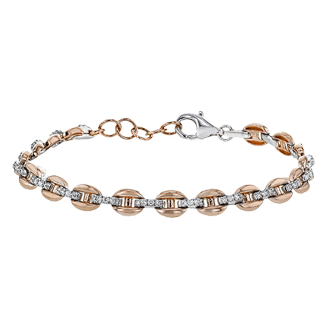 The Simon G. 18K White and Rose Gold Diamond Bracelet features alternating oval links in rose gold and sparkling diamonds, finished with a silver lobster clasp and adjustable chain for an elegant, refined look.