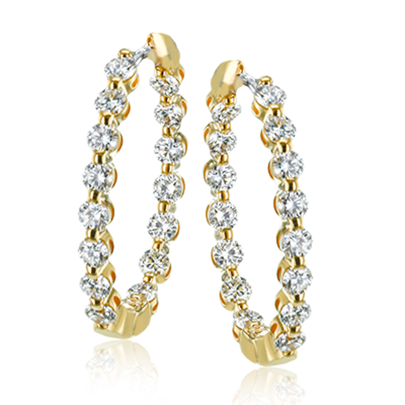 The Simon G. 18K Yellow Gold Diamond Hoop Earrings by Simon G feature a modern design embellished with sparkling white diamonds, creating an elegant and luxurious look. These diamonds are set closely along the hoops, enhancing their brilliance and shine.