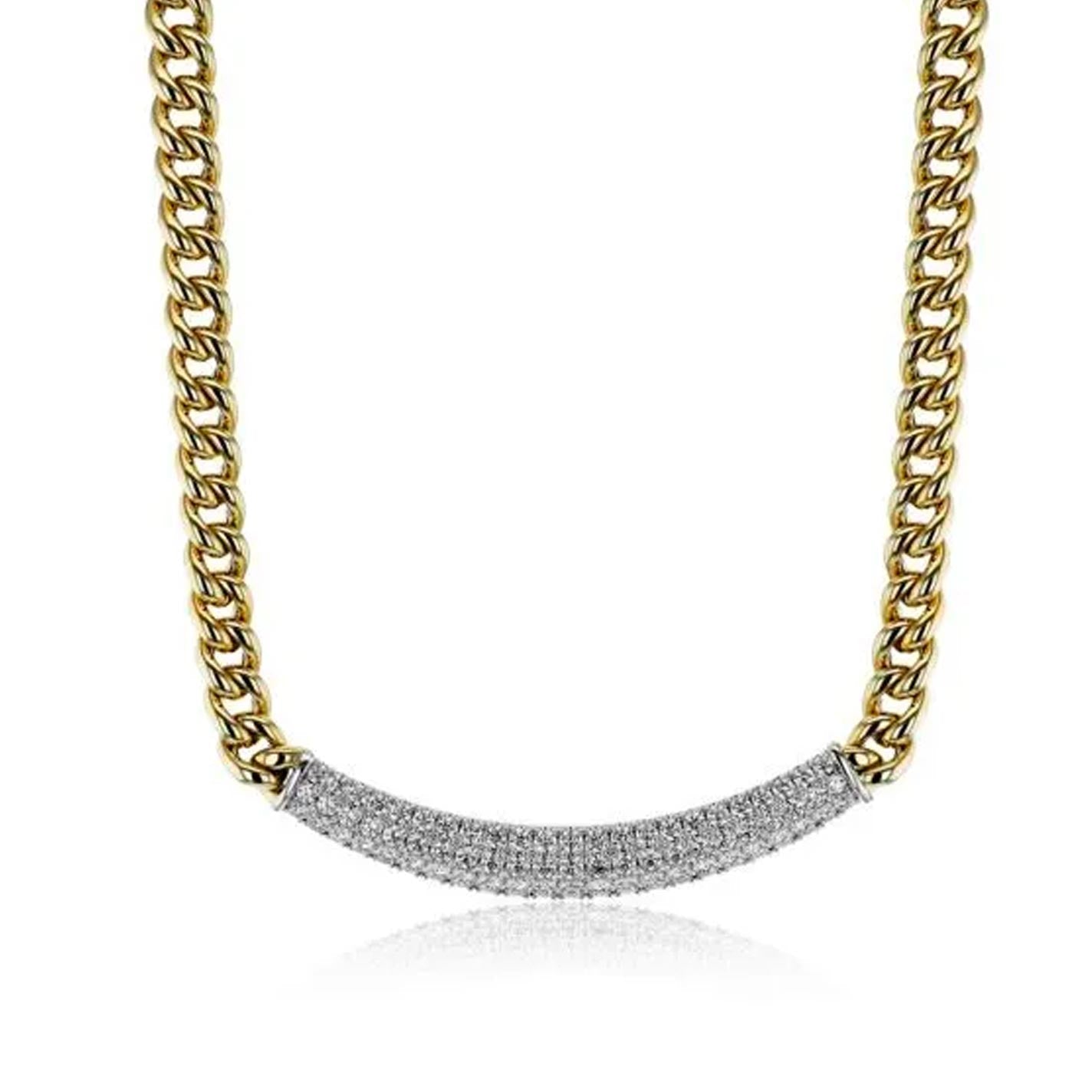 The Simon G. 18K White Gold Diamond Cuban Chain Necklace presents a sophisticated design with its curved silver bar adorned with diamonds at the center. Crafted from interconnected links, this elegant piece from the Simon G brand exudes timeless style against a white backdrop.