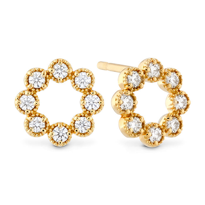 Hearts On Fire presents the exquisite Liliana Milgrain Stud Earrings, crafted in yellow gold and shaped like flowers, with each petal featuring a dazzling Hearts On Fire diamond.