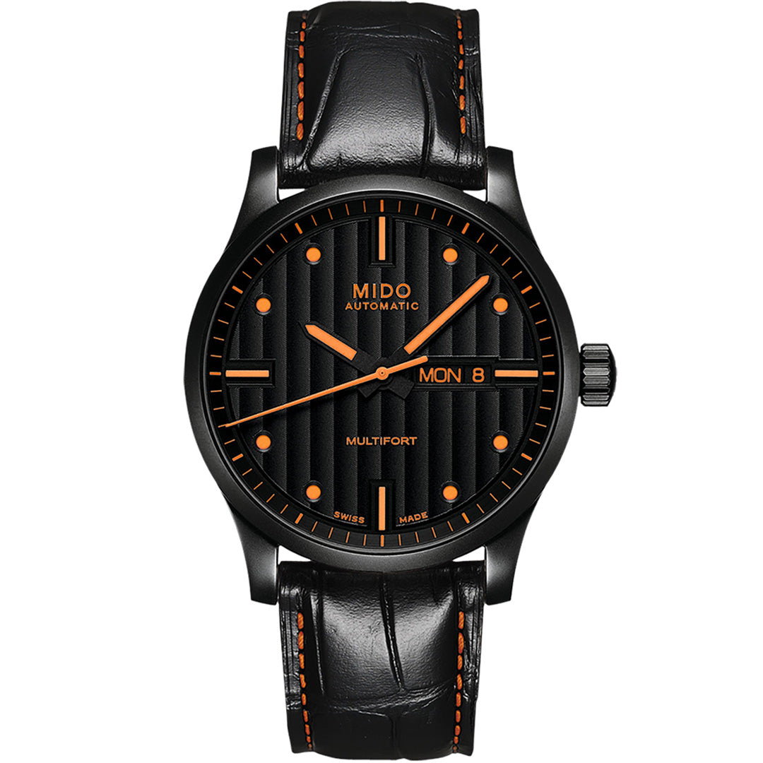 The MIDO Multifort Special Edition Automatic 42mm Watch features a textured black dial with orange hour markers, day-date display, and a black leather strap with orange stitching.