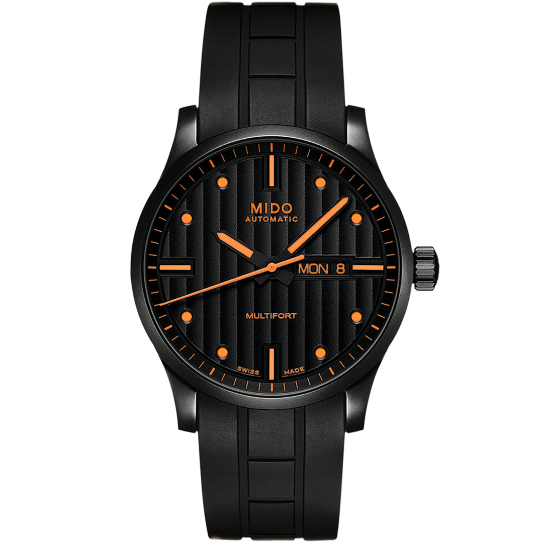 The MIDO Multifort Gent Automatic 42mm Watch features a black dial with orange hands and markers, a day-date display on the right, and a black rubber strap.
