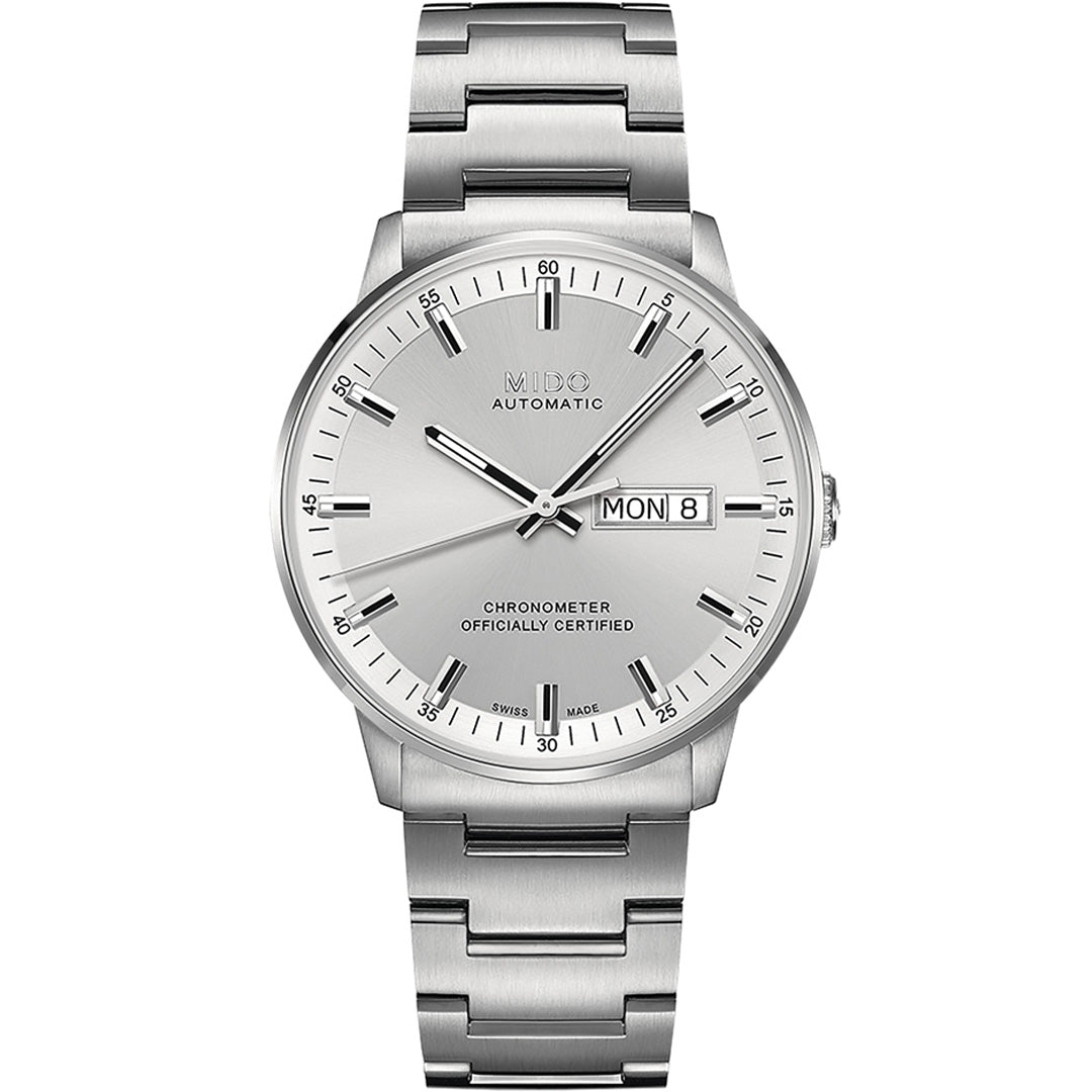 The MIDO Commander Chronometer Automatic 40mm Watch features a silver metal band, white dial, black markers and hands, with day/date display at 3 o’clock and “Chronometer Officially Certified” on the face.