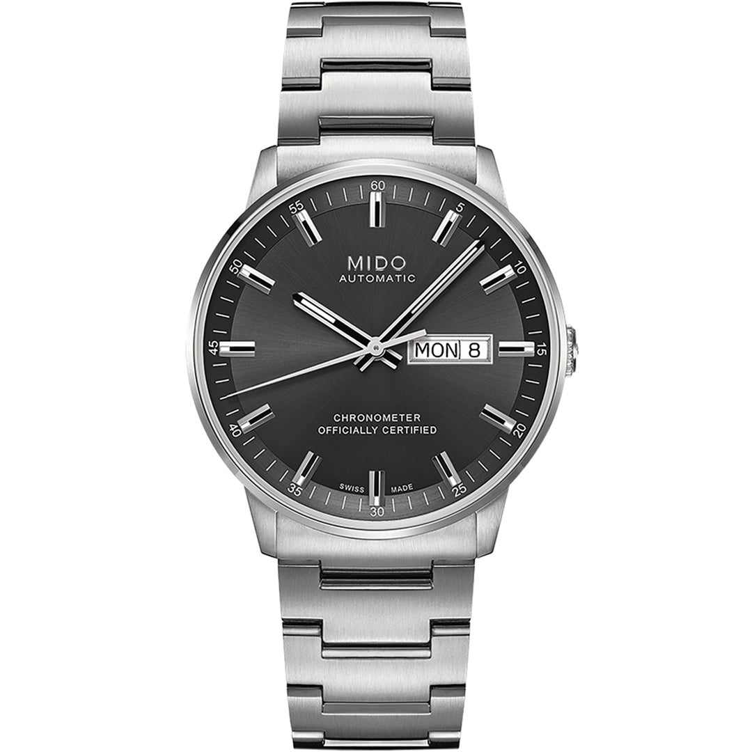 The MIDO Commander Chronometer Automatic 40mm Watch features a stainless steel case, black dial, silver hour markers and hands, automatic movement, day-date display, and a metal link bracelet.