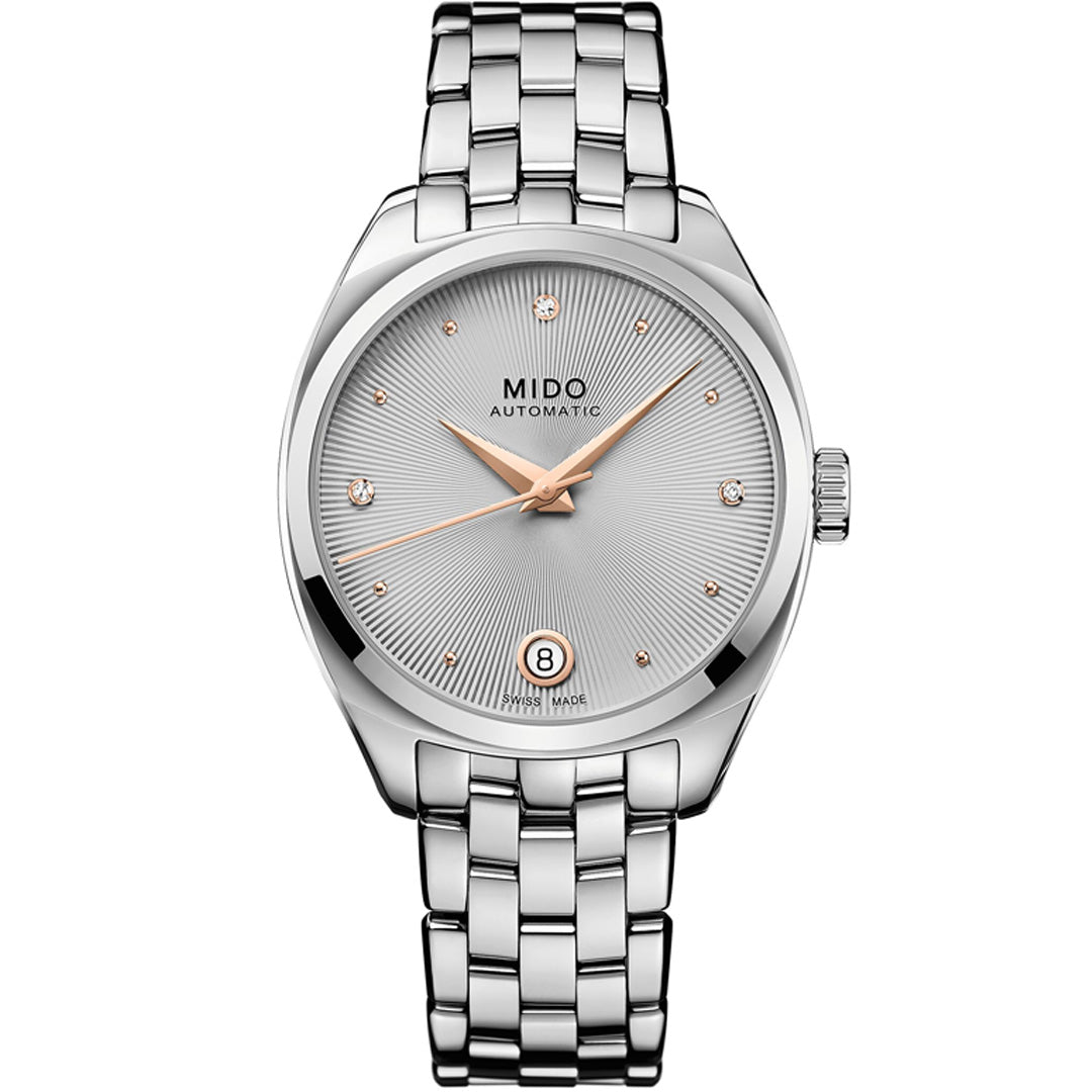 The MIDO Belluna Royal Lady Automatic 33.4mm Watch features a silver metallic bracelet, sunburst dial, rose gold hands and markers, automatic movement, and a date window at 6 o’clock.