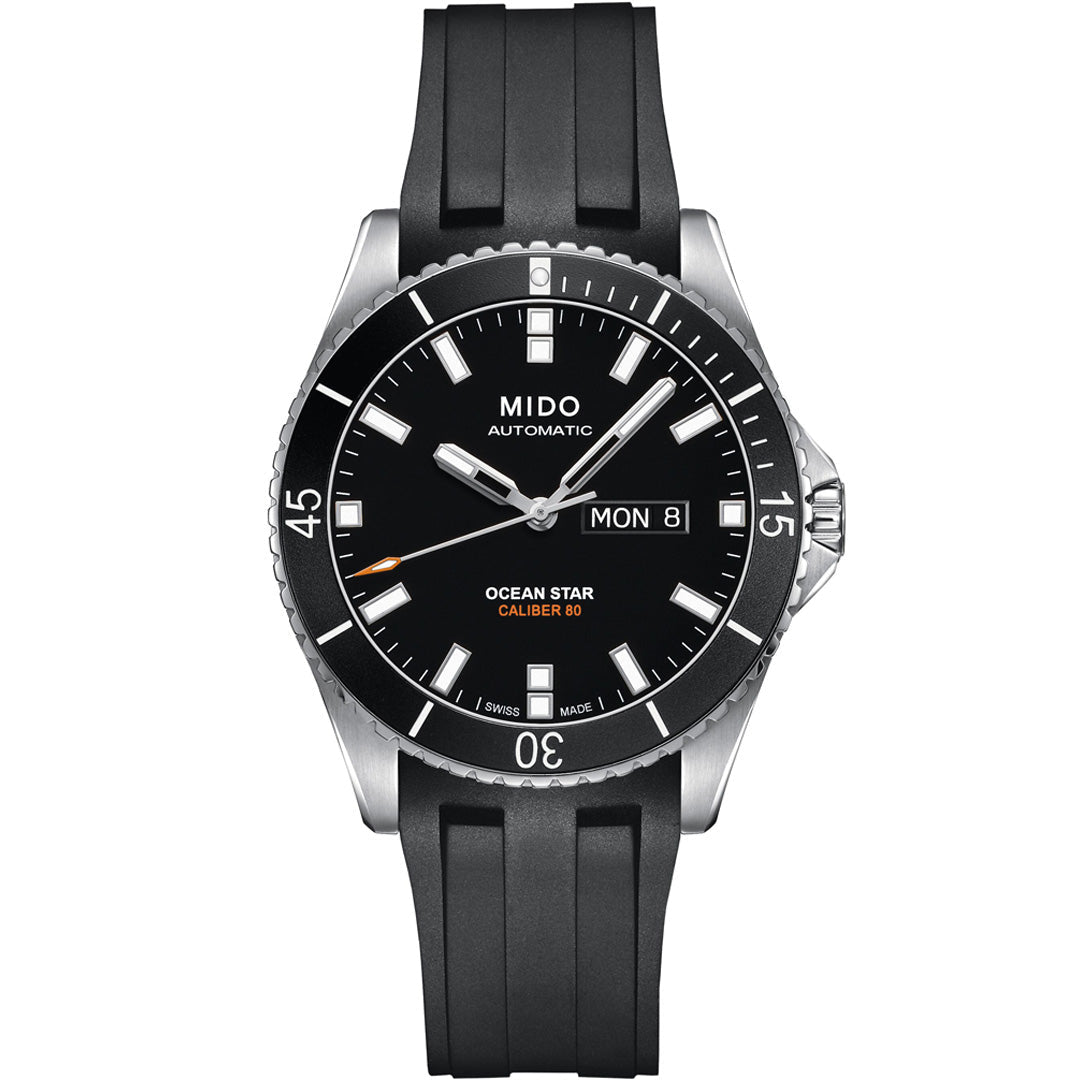 The MIDO Ocean Star 200 Automatic 42.5mm Watch features a black dial, luminous markers, silver bezel, black rubber strap, and shows day-date at 3 o’clock. This MIDO watch is water-resistant and stylishly designed for durability.