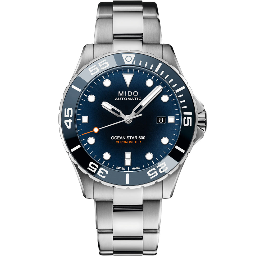 The MIDO Ocean Star Diver 600 Chronometer Automatic 43.5mm Watch features a stainless steel case, blue dial, white hour markers, COSC-certified movement, date at 3 o’clock, and a unidirectional ceramic bezel.