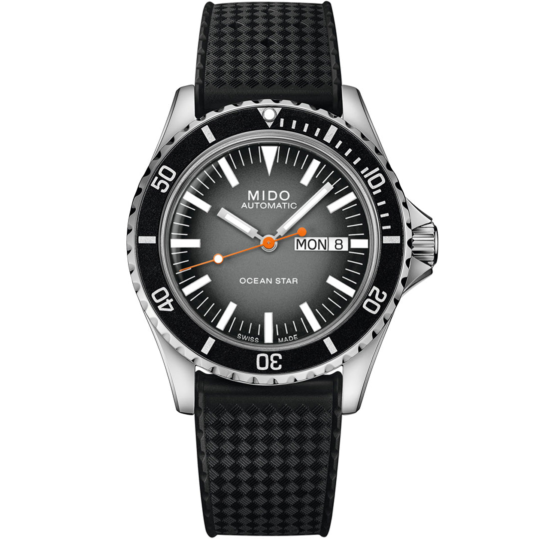The MIDO Ocean Star Tribute Gradient Automatic 40.5mm Watch features a black textured strap, black bezel, gradient gray dial, day/date display, and orange-accented hands—an elegant Swiss diving timepiece by MIDO.