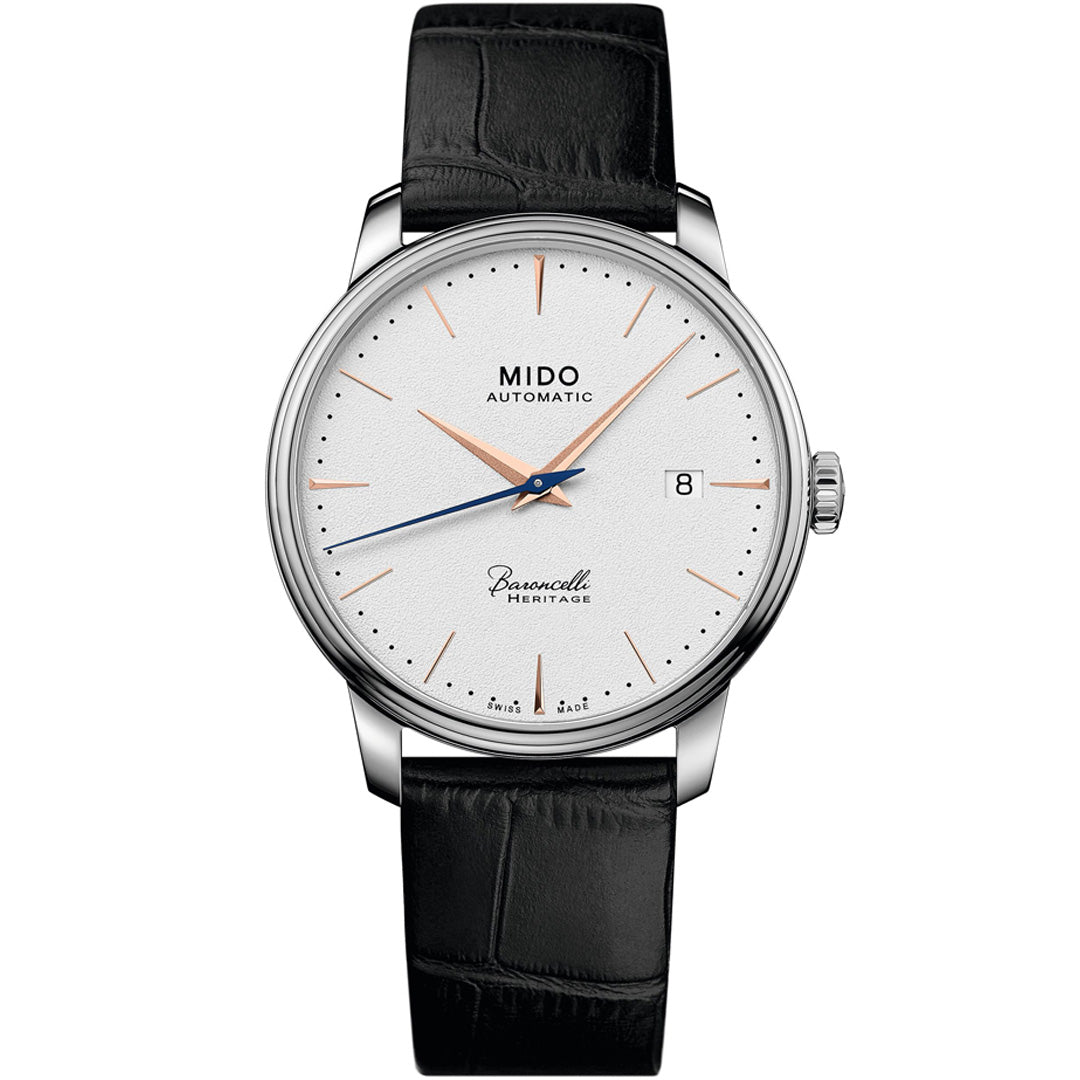 The MIDO Baroncelli Heritage Automatic 39mm watch features a silver case, white dial with rose gold markers, Swiss automatic movement, date window at 3 o’clock, black leather strap, and "Baroncelli Heritage" above 6 o'clock.