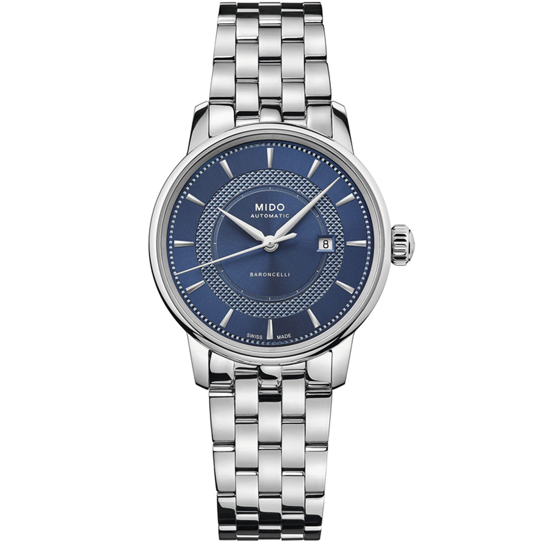 The MIDO Baroncelli II Signature Lady Automatic 30mm Watch features a silver case, blue textured dial, silver hour markers, date window at 3 o’clock, and a polished metal link bracelet—highlighting the refined craftsmanship of MIDO.