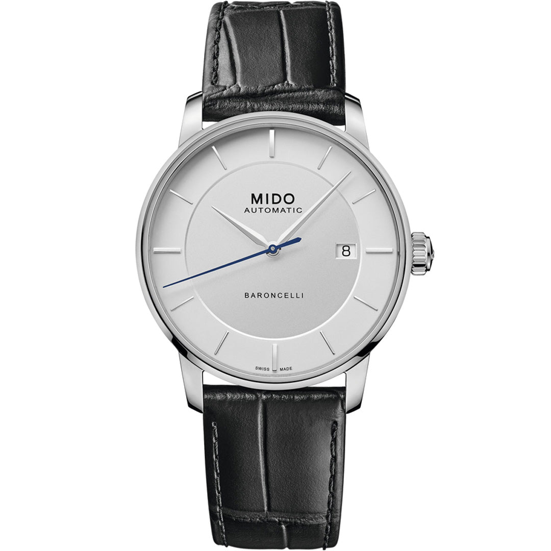 The MIDO Baroncelli II Signature Gent Automatic 39mm Watch features a white dial, minimalist silver markers, blue second hand, date at 3 o’clock, automatic movement, and a black leather strap.