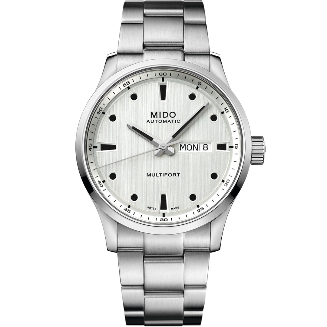 The MIDO Multifort M Automatic 42mm Watch features a silver metal band, white dial, black hour markers, and day-date display set to Monday 8. Powered by the Caliber 80 movement, it showcases three hands and a minimalist design.