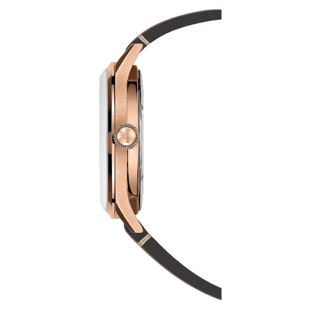 Side view of the MIDO Multifort Patrimony Automatic 40mm Watch, displaying its rose gold case, black bezel, ridged crown, and black strap with metallic accents. Set against a white background; features automatic movement.