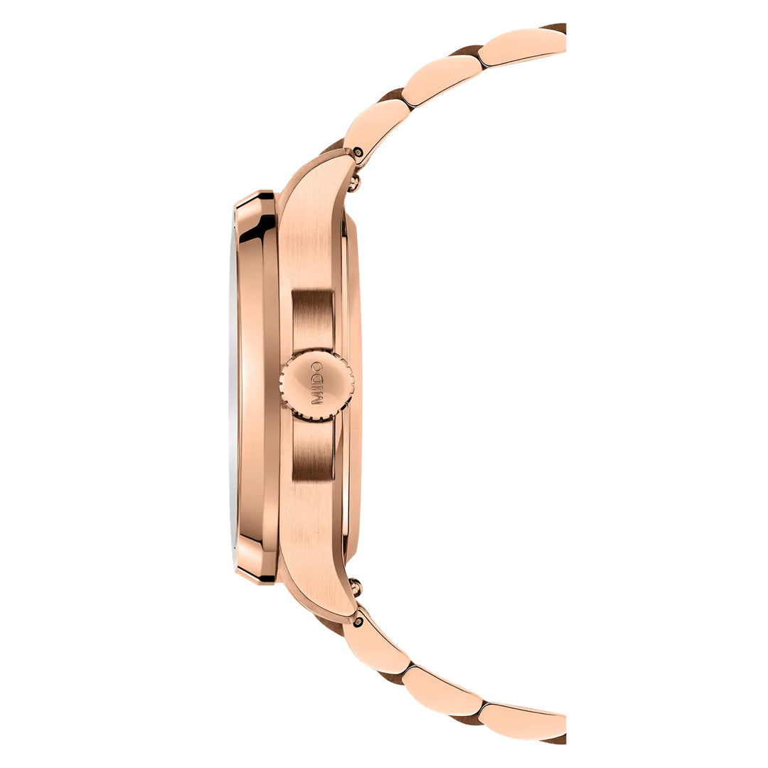 Side view of the MIDO Multifort TV Big Date Automatic 39.2mm Watch, showing its rose gold metal bracelet, crown, and case. The polished and brushed finish emphasizes its sleek style and refined automatic movement by MIDO.