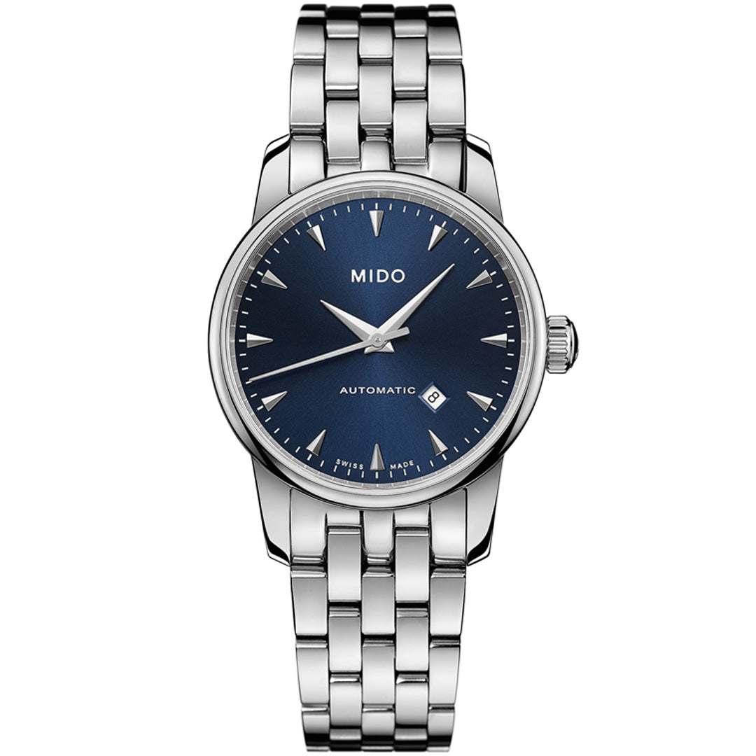 The MIDO Baroncelli II Lady Automatic 29mm Watch features a silver case, blue dial, silver markers and hands, a date window at 3 o’clock, and a stainless steel link bracelet.