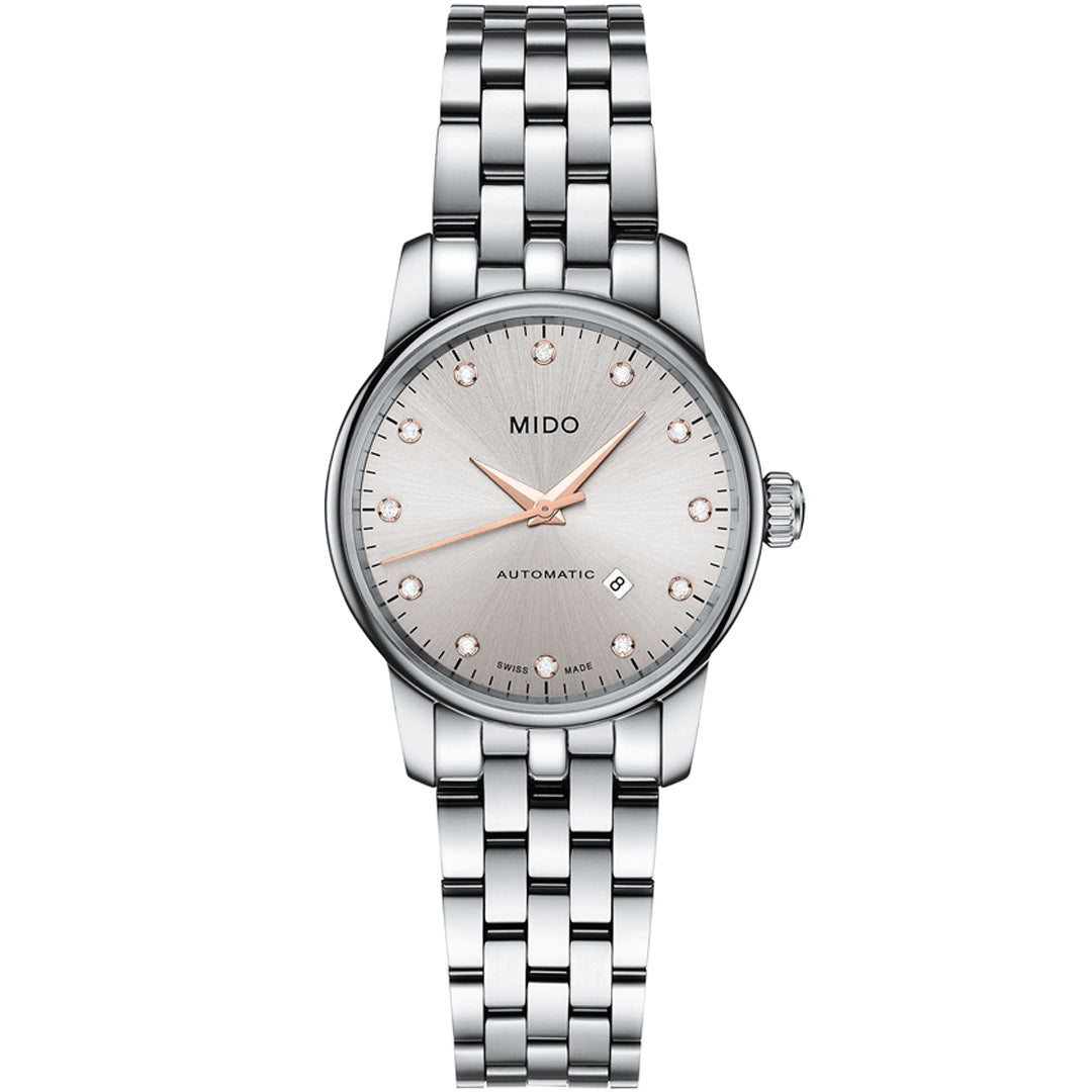 The MIDO Baroncelli II Lady Automatic 29mm Watch features a silver metal link bracelet, round light dial, rose gold hour markers, date at 3 o'clock, and "MIDO AUTOMATIC" text—a refined fusion of elegance and Swiss precision.
